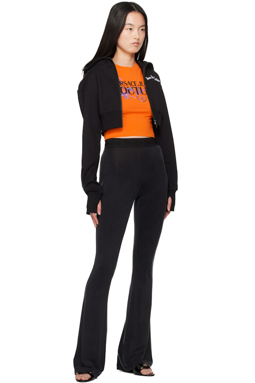 French terry hoodie. 

· Integrated stand collar at hood
· Zip closure
· Logo embroidered at chest
· Rib-knit cropped hem and cuffs
· Dropped shoulders

Supplier color: Black/Print