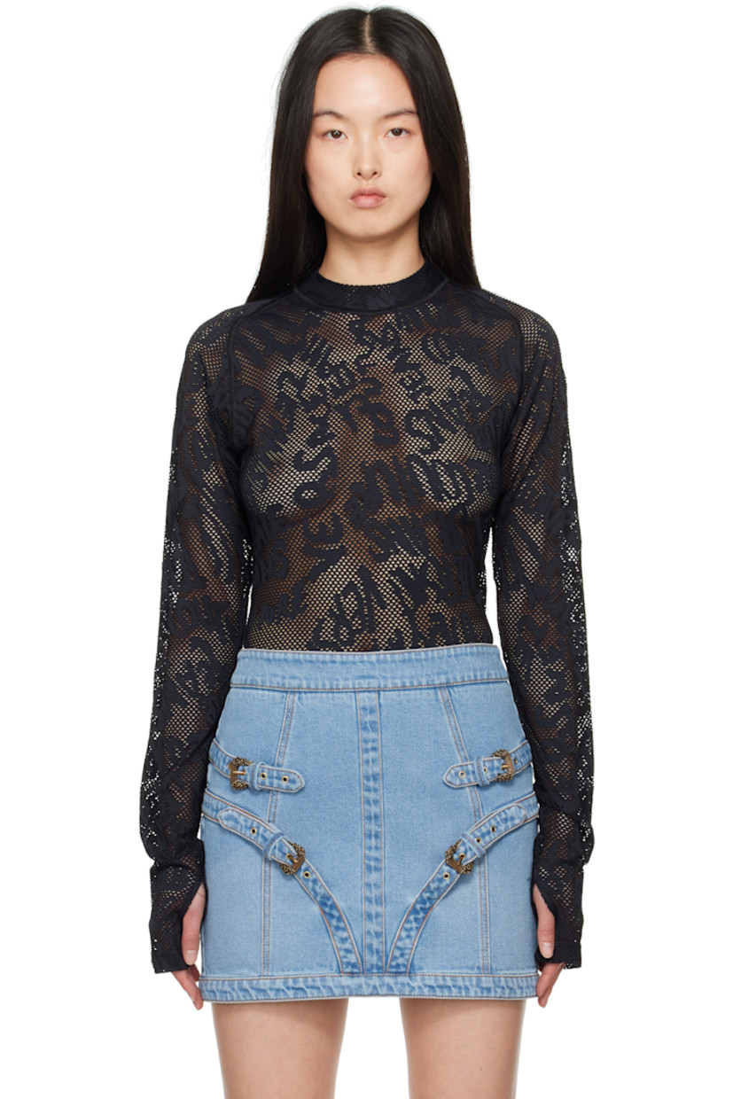 Sheer stretch nylon fishnet T-shirt. Jacquard logo pattern throughout. 

· Mock neck
· Logo patch at front hem
· Raglan sleeves
· Thumbhole at cuffs

Supplier color: Black