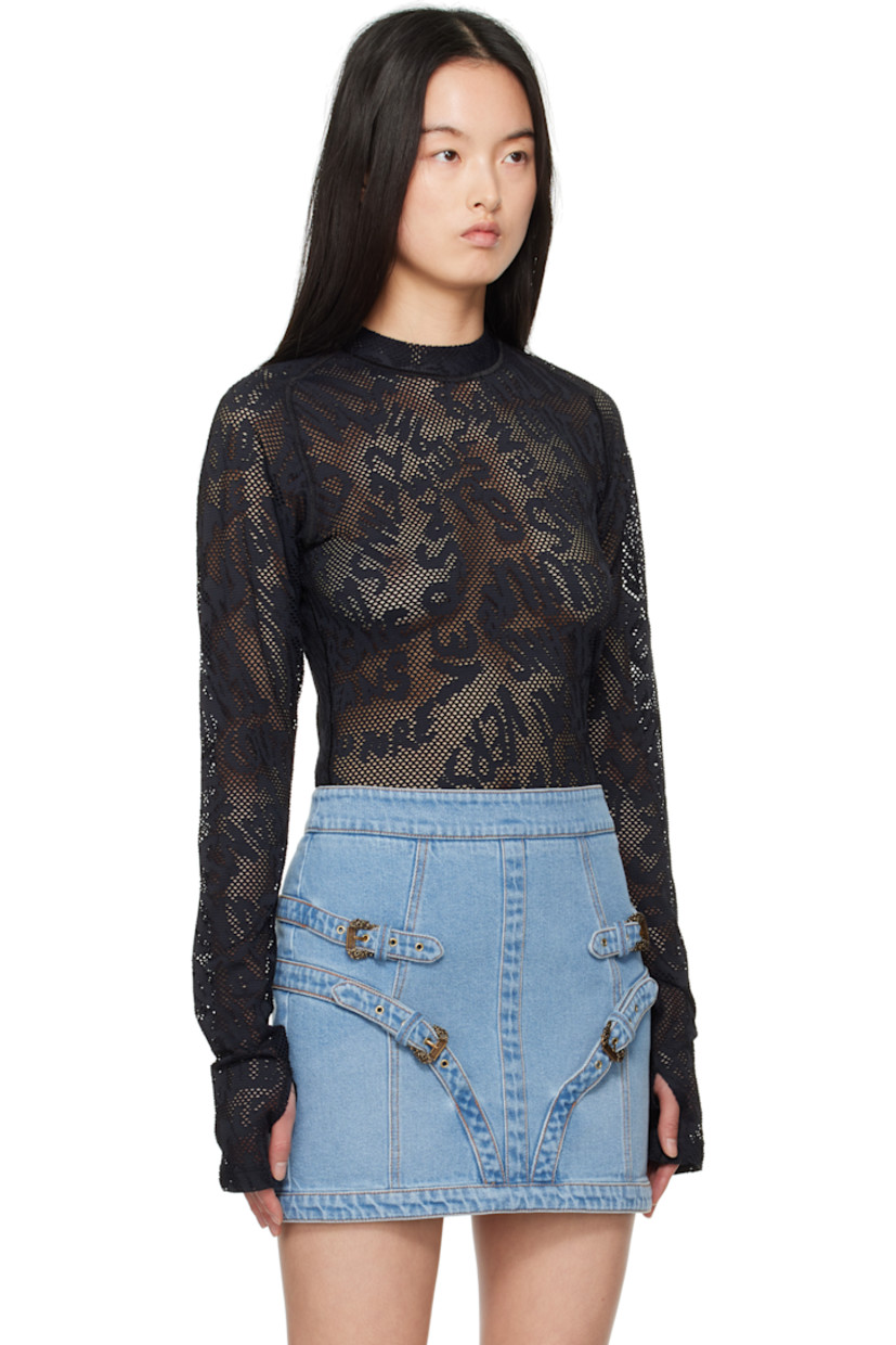 Sheer stretch nylon fishnet T-shirt. Jacquard logo pattern throughout. 

· Mock neck
· Logo patch at front hem
· Raglan sleeves
· Thumbhole at cuffs

Supplier color: Black