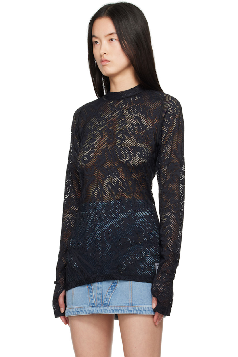 Sheer stretch nylon fishnet T-shirt. Jacquard logo pattern throughout. 

· Mock neck
· Logo patch at front hem
· Raglan sleeves
· Thumbhole at cuffs

Supplier color: Black