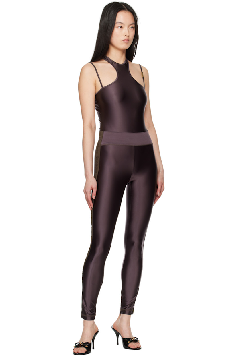 Stretch nylon satin bodysuit. 

· Crewneck
· Press-stud closure at bottom
· Adjustable spaghetti straps
· Logo hardware at strap
· Racer back
· Unlined

Supplier color: Brown