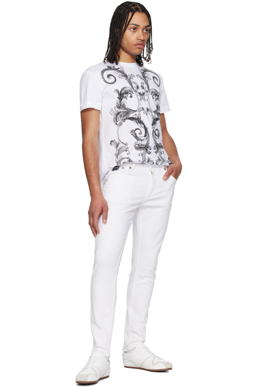 Stretch denim jeans. 

· Belt loops
· Five-pocket styling
· Zip fly
· Embroidered logo patch at coin pocket
· Leather logo patch at back waistband
· Logo-engraved silver-tone hardware

Supplier color: White