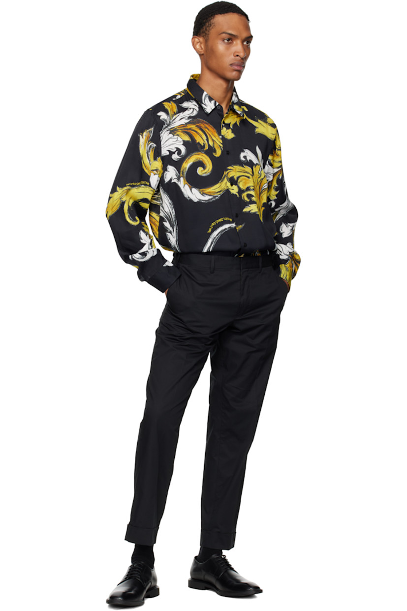 Viscose twill shirt. 

· Barocco pattern printed throughout
· Spread collar
· Button closure
· Shirttail hem
· Buttoned barrel cuffs

Supplier color: Black/Gold