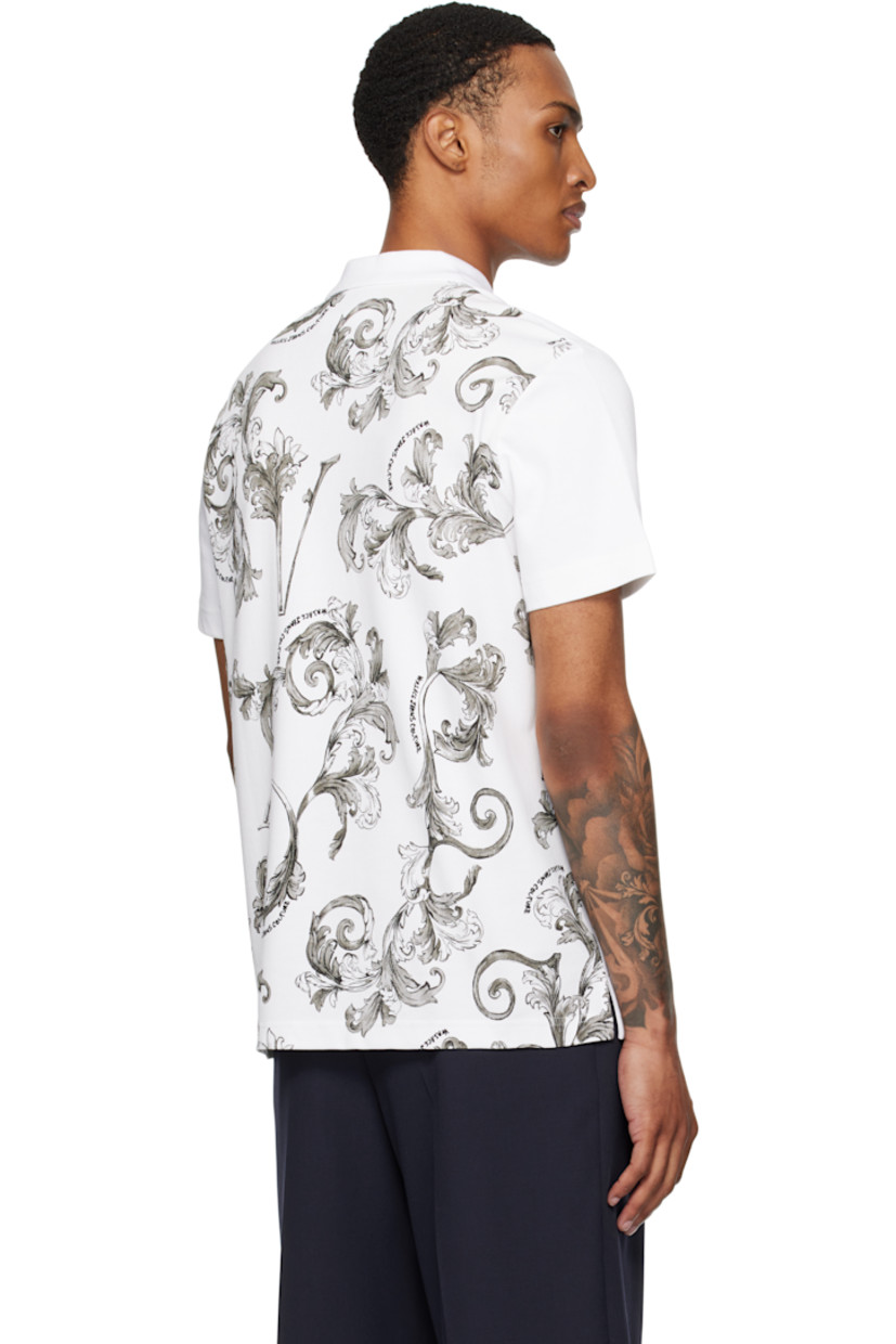 Cotton piqué polo.

· Rib-knit spread collar and cuffs
· Three-button placket
· Logo plaque at chest
· Barocco pattern printed at placket and back
· Tennis-tail hem

Supplier color: White/Print
