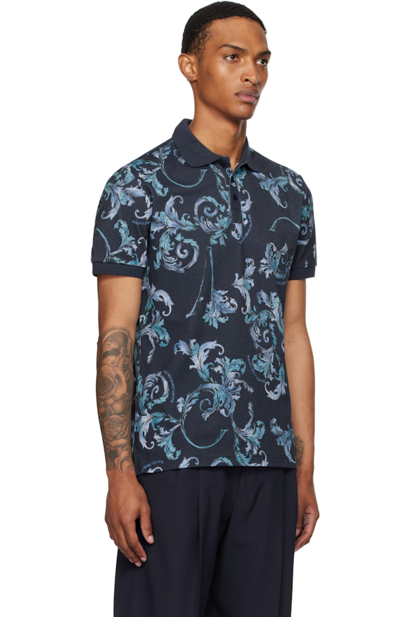 Cotton piqué polo.

· Barocco pattern printed throughout
· Rib-knit spread collar and cuffs
· Three-button placket
· Tennis-tail hem

Supplier color: Ocean
