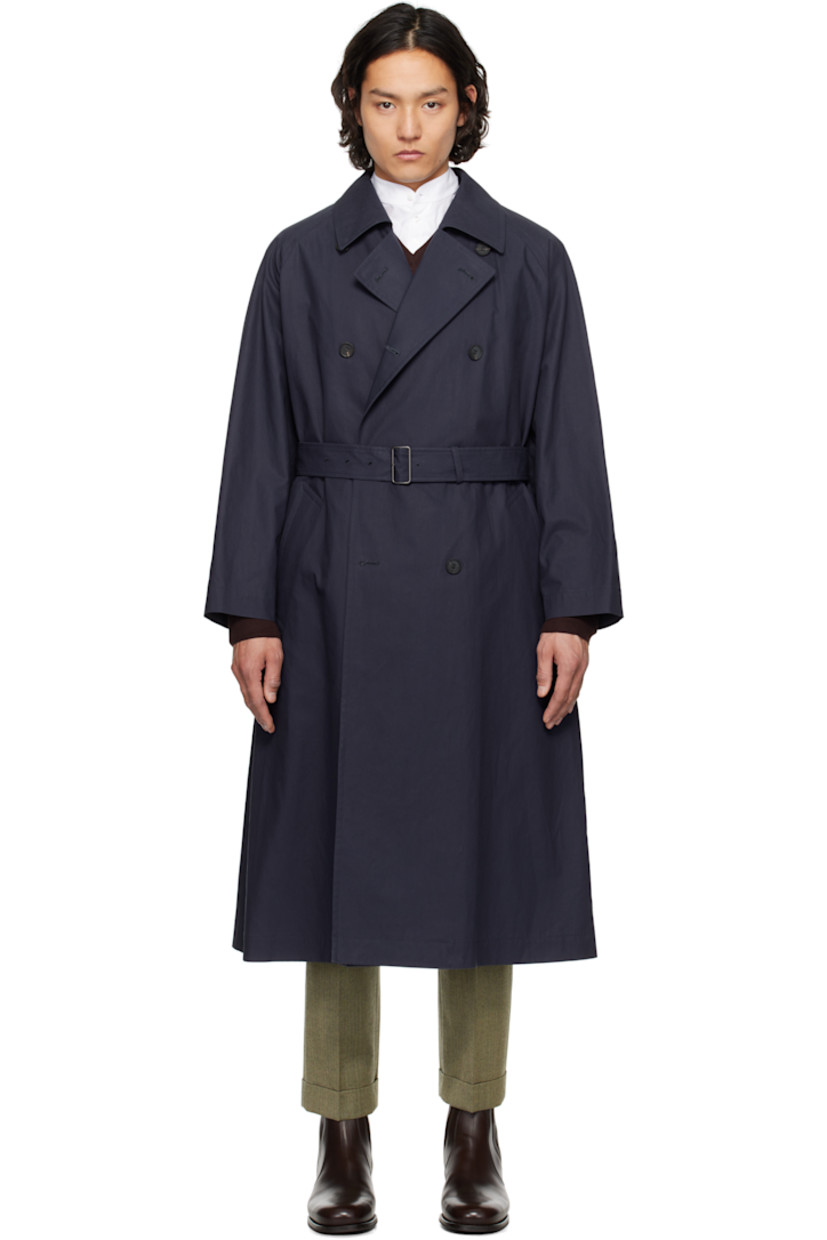 Cotton broadcloth trench coat. 

· Spread collar
· Double-breasted button closure
· Detachable pin-buckle belt 
· Welt pockets
· Raglan sleeves
· Adjustable button tab at cuffs
· Central vent at back hem
· Detachable padded and quilted cupro satin liner

Supplier color: Navy