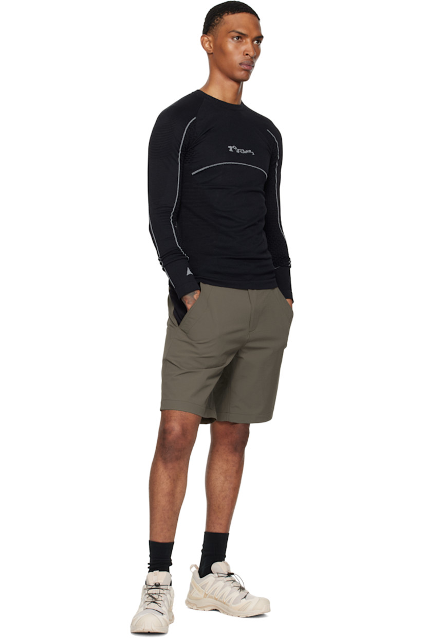 Stretch nylon piqué T-shirt.

· Rib-knit crewneck
· Jacquard logo at chest and cuff
· Jacquard stripes at front, sleeves, and back
· Honeycomb detailing at sleeves and back

Supplier color: Black