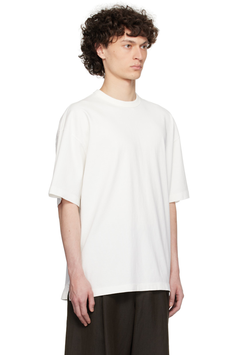 Pigment-dyed cotton jersey T-shirt. 

· Boxy-fit 
· Rib-knit crewneck
· Tennis-tail hem
· Dropped shoulders

Supplier color: White