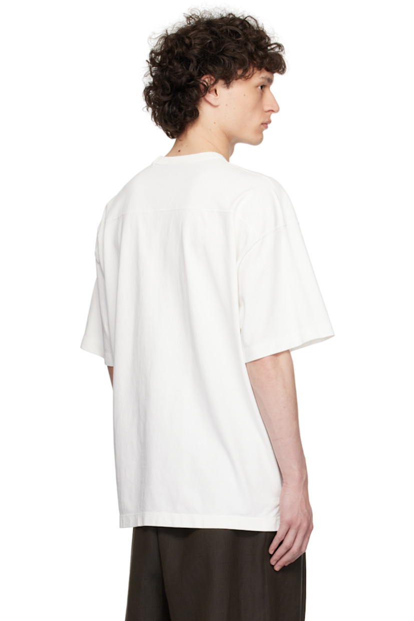 Pigment-dyed cotton jersey T-shirt. 

· Boxy-fit 
· Rib-knit crewneck
· Tennis-tail hem
· Dropped shoulders

Supplier color: White