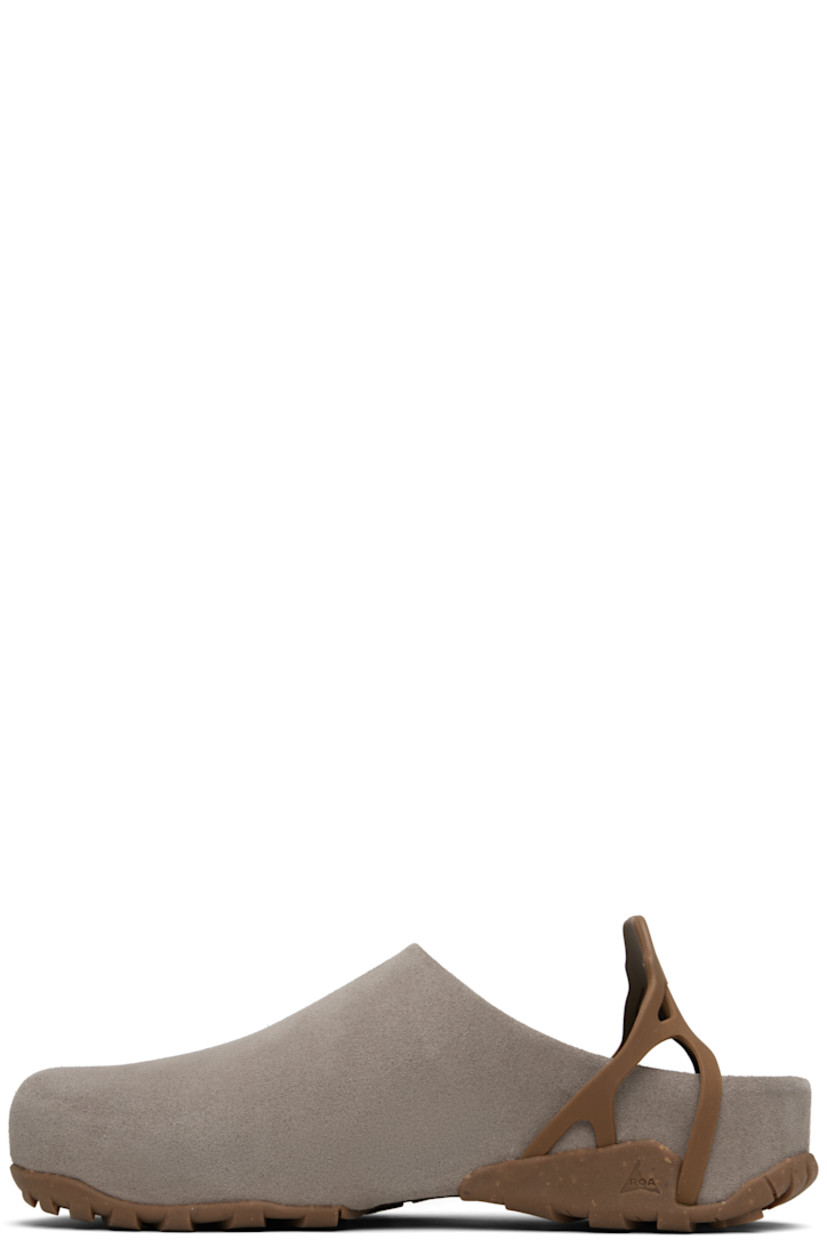 LWG-certified calfskin suede mules.

· Logo-embossed ankle strap
· Treaded Vibram® Ecostep rubber sole

Supplier color: Grey