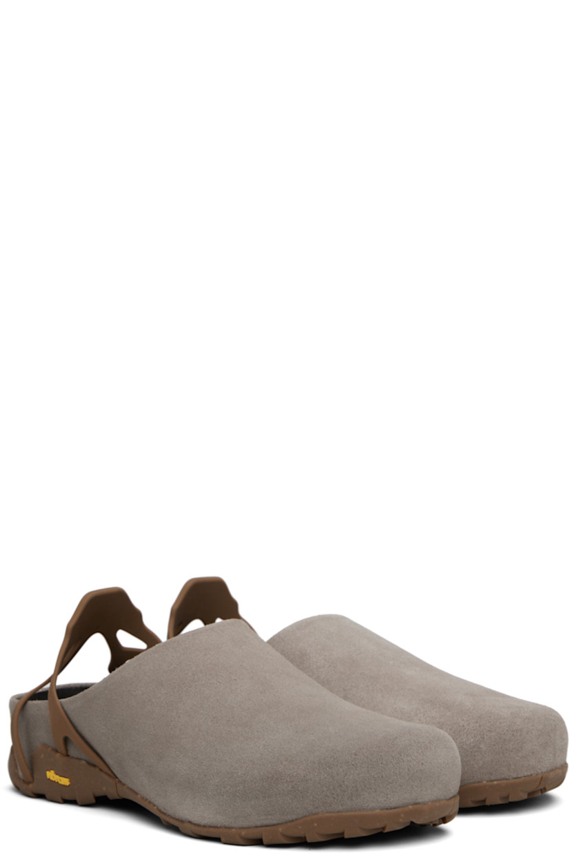 LWG-certified calfskin suede mules.

· Logo-embossed ankle strap
· Treaded Vibram® Ecostep rubber sole

Supplier color: Grey
