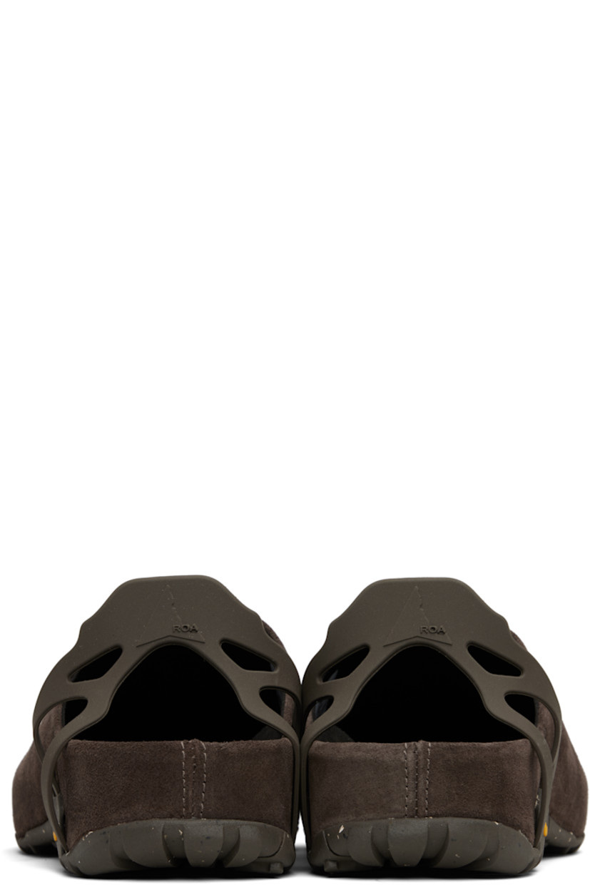 Brushed suede clogs.

· LWG-certified leather
· Logo-embossed collapsible rubber heel strap
· Faux-suede lining
· Speckled Vibram® Ecostep crêpe-rubber sole
 
Supplier color: Brown