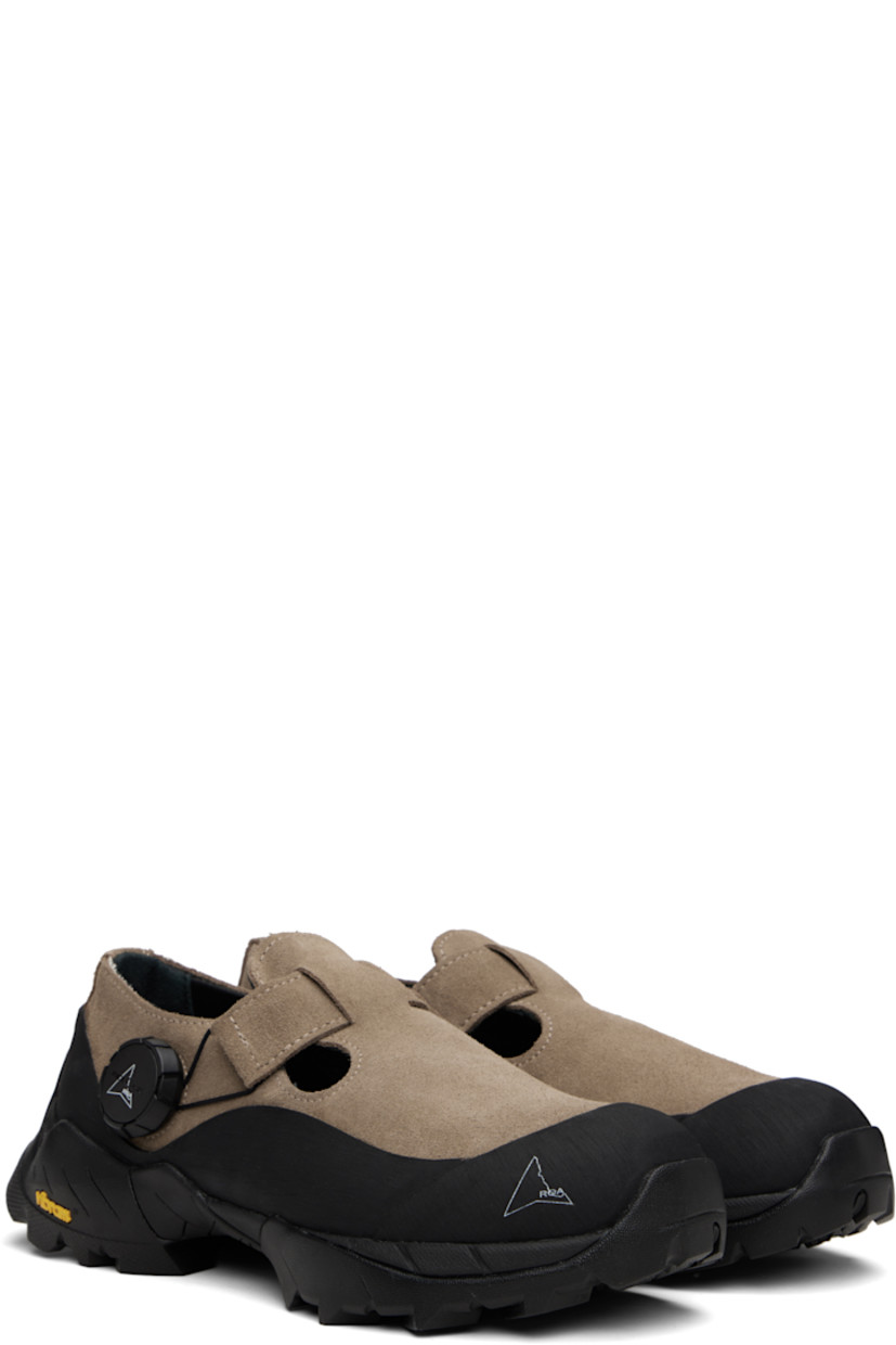 LWG-certified calfskin suede Mary Jane-style sneakers.

· Rubberized trim throughout
· Logo printed at rubber cap toe
· Cutouts at vamp
· Fidlock® WINCH closure
· Buffed leather lining
· Treaded Vibram® Megagrip rubber sole

Supplier color: Taupe
