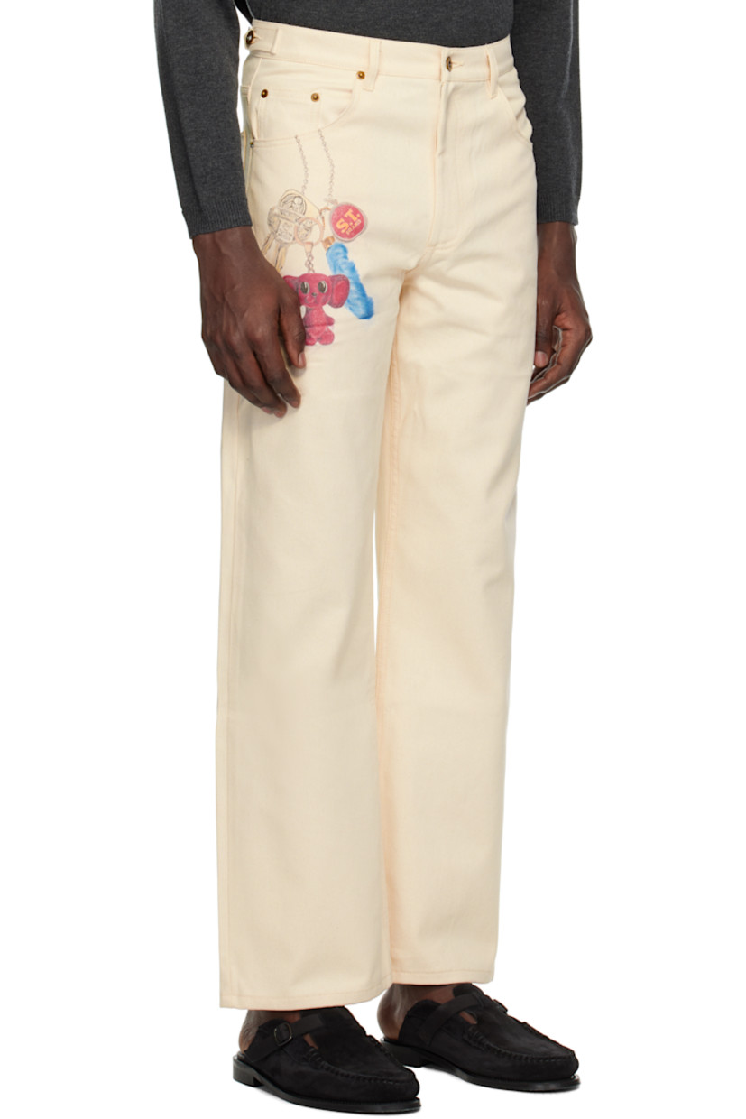Non-stretch denim jeans. 

· Belt loops
· Adjustable button tabs at waistband
· Five-pocket styling
· Zip fly
· Printed graphic at front and back

Supplier color: Off white