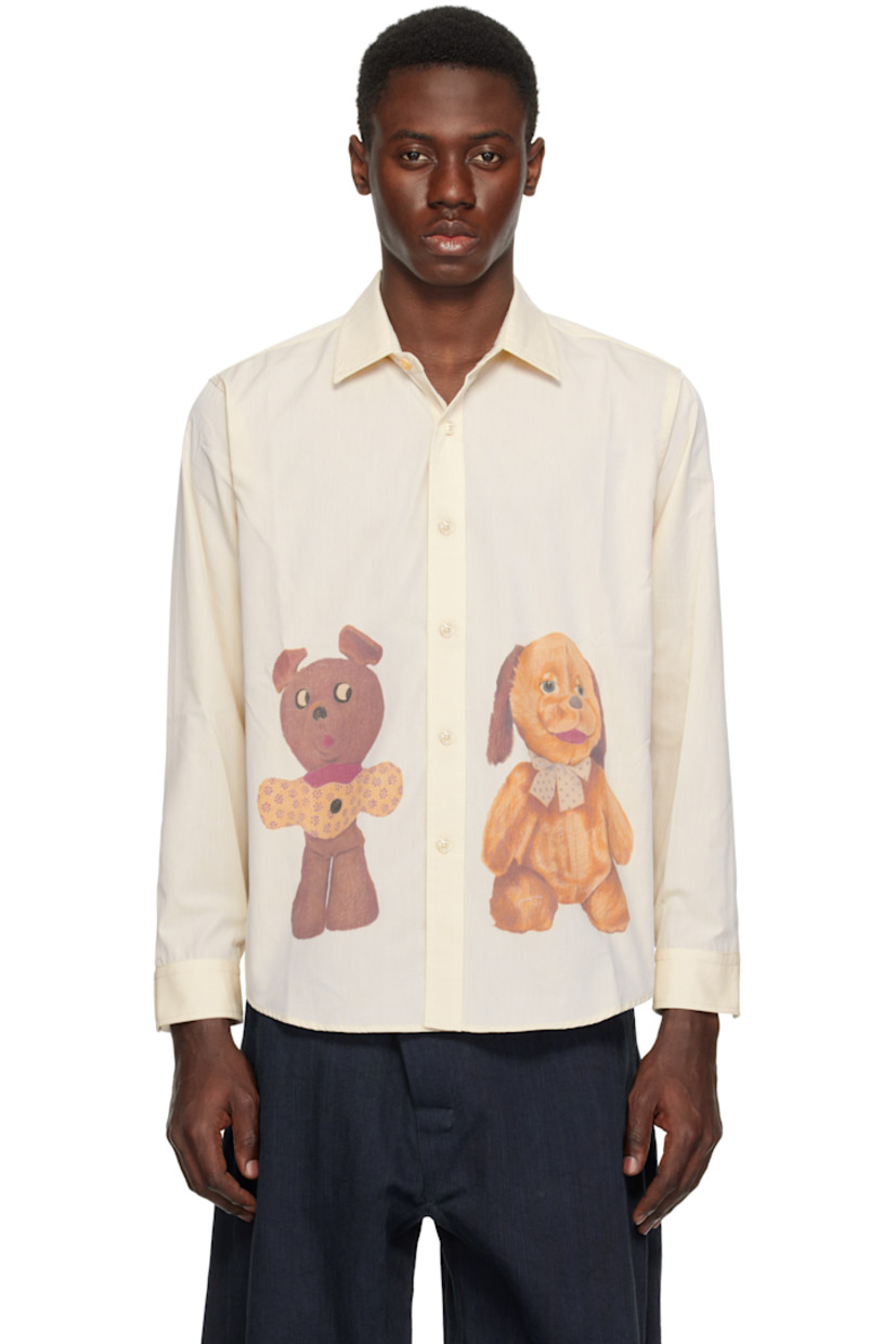 Cotton poplin shirt. 

· Spread collar
· Button closure
· Graphics printed at front
· Shirttail hem
· Adjustable buttoned barrel cuffs

Supplier color: Beige