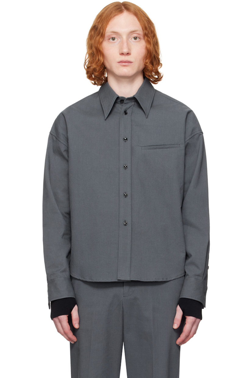 Crinkled plain-woven cotton shirt.

· Spread collar
· Button closure
· Welt pocket
· Shirttail hem
· Dropped shoulders
· Single-button barrel cuffs
· Flap pocket and twin pleats at back yoke

Supplier color: Gray