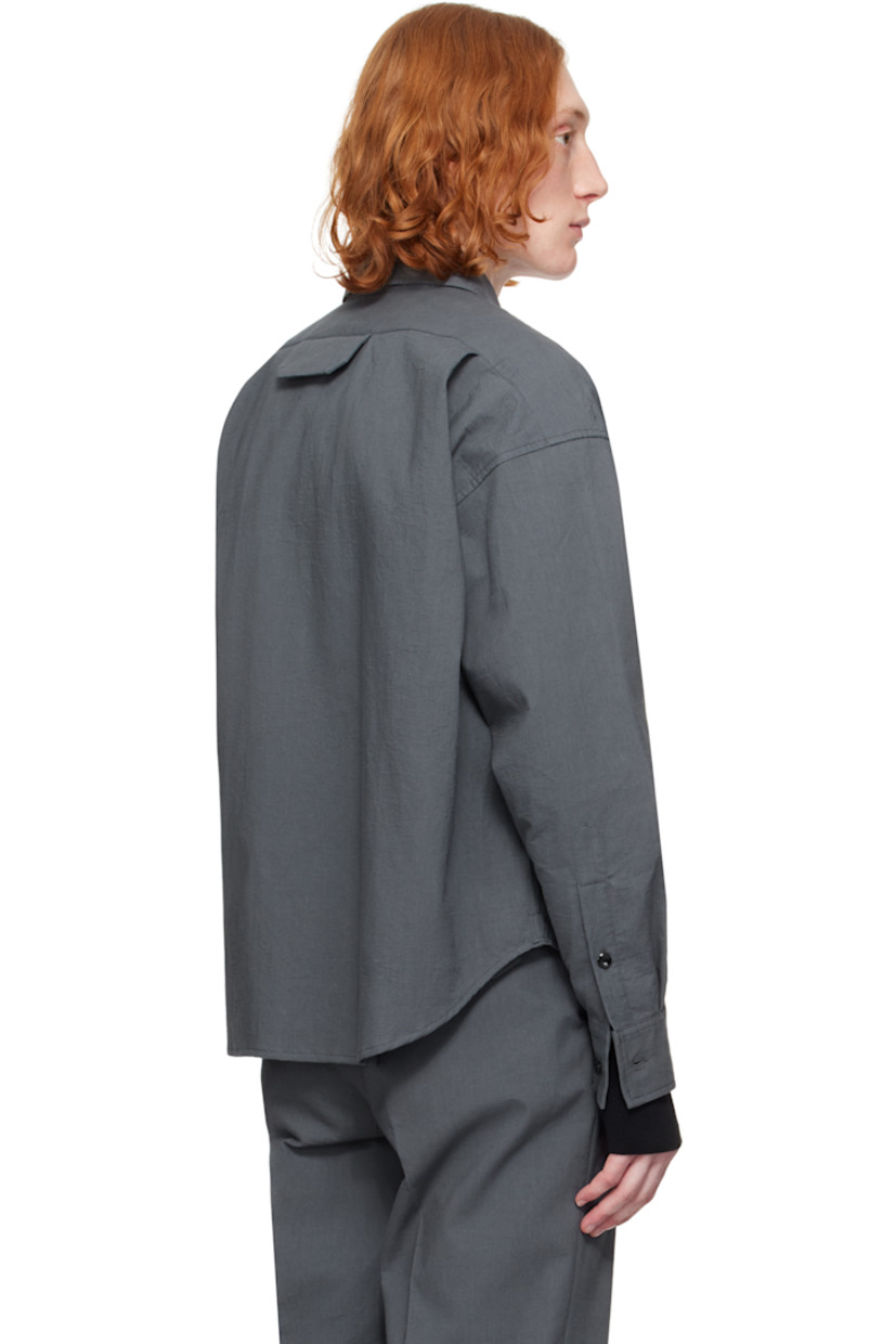 Crinkled plain-woven cotton shirt.

· Spread collar
· Button closure
· Welt pocket
· Shirttail hem
· Dropped shoulders
· Single-button barrel cuffs
· Flap pocket and twin pleats at back yoke

Supplier color: Gray