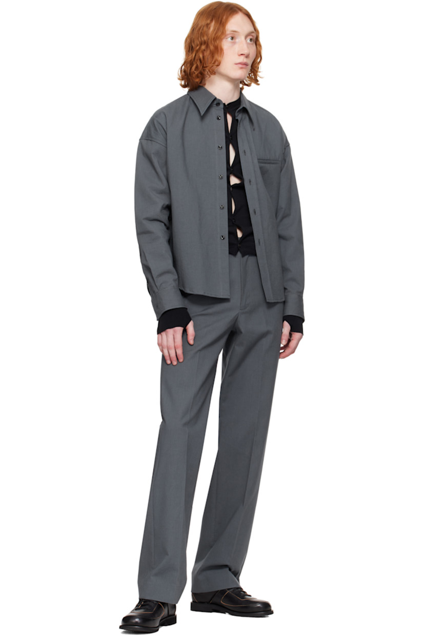 Crinkled plain-woven cotton shirt.

· Spread collar
· Button closure
· Welt pocket
· Shirttail hem
· Dropped shoulders
· Single-button barrel cuffs
· Flap pocket and twin pleats at back yoke

Supplier color: Gray