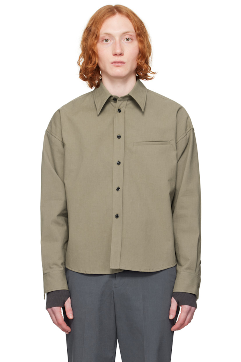 Crinkled plain-woven cotton shirt.

· Spread collar
�· Button closure
· Welt pocket
· Shirttail hem
· Dropped shoulders
· Single-button barrel cuffs
· Flap pocket and twin pleats at back yoke

Supplier color: Taupe