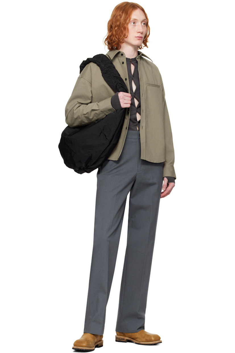 Crinkled plain-woven cotton shirt.

· Spread collar
· Button closure
· Welt pocket
· Shirttail hem
· Dropped shoulders
· Single-button barrel cuffs
· Flap pocket and twin pleats at back yoke

Supplier color: Taupe