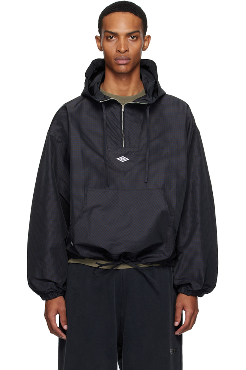 Polyester twill anorak. Check pattern throughout.

· Integrated logo-embroidered balaclava at hood
· Drawstring at stand collar and hem 
· Half-zip closure
· Logo embroidered at chest
· Kangaroo pocket with logo flag at waist
· Dropped shoulders
· Elasticized cuffs
· Unlined

Supplier color: Navy/Dark Brown