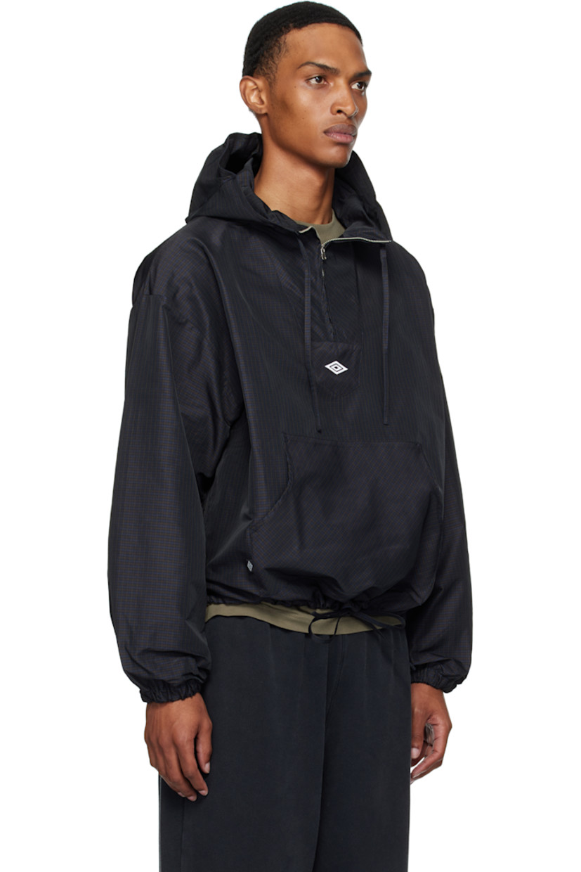 Polyester twill anorak. Check pattern throughout.

· Integrated logo-embroidered balaclava at hood
· Drawstring at stand collar and hem 
· Half-zip closure
· Logo embroidered at chest
· Kangaroo pocket with logo flag at waist
· Dropped shoulders
· Elasticized cuffs
· Unlined

Supplier color: Navy/Dark Brown