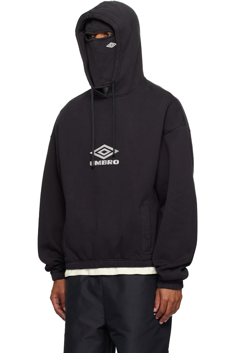 Heavyweight cotton fleece hoodie. 

· Drawstring and integrated balaclava at hood
· Embroidered logo at front
· Welt pockets at waist
· Elasticized hem and cuffs
· Dropped shoulders

Supplier color: Black