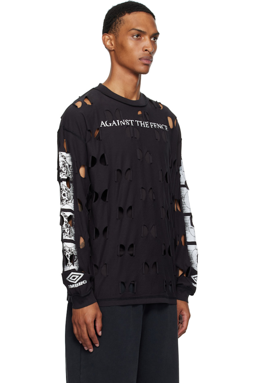 Cotton jersey T-shirt.

· Raw-edge cutout pattern throughout 
· Inverted seams throughout
· Rib-knit crewneck and cuffs
· Text printed at chest
· Printed graphics at sleeves

Supplier color: Black
