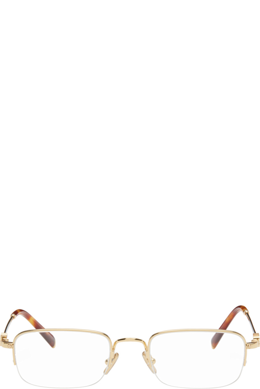 Rectangular semi-rimless metal-frame optical glasses in gold tone. 

· Adjustable rubber nose pads
· Logo hardware at temples
· Tortoiseshell acetate temple tips
· Includes case
· Size: 53.21 140 

Supplier color: Gold