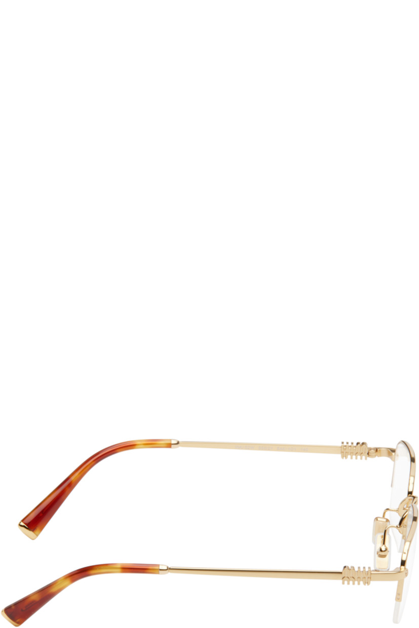 Rectangular semi-rimless metal-frame optical glasses in gold tone. 

· Adjustable rubber nose pads
· Logo hardware at temples
· Tortoiseshell acetate temple tips
· Includes case
· Size: 53.21 140 

Supplier color: Gold