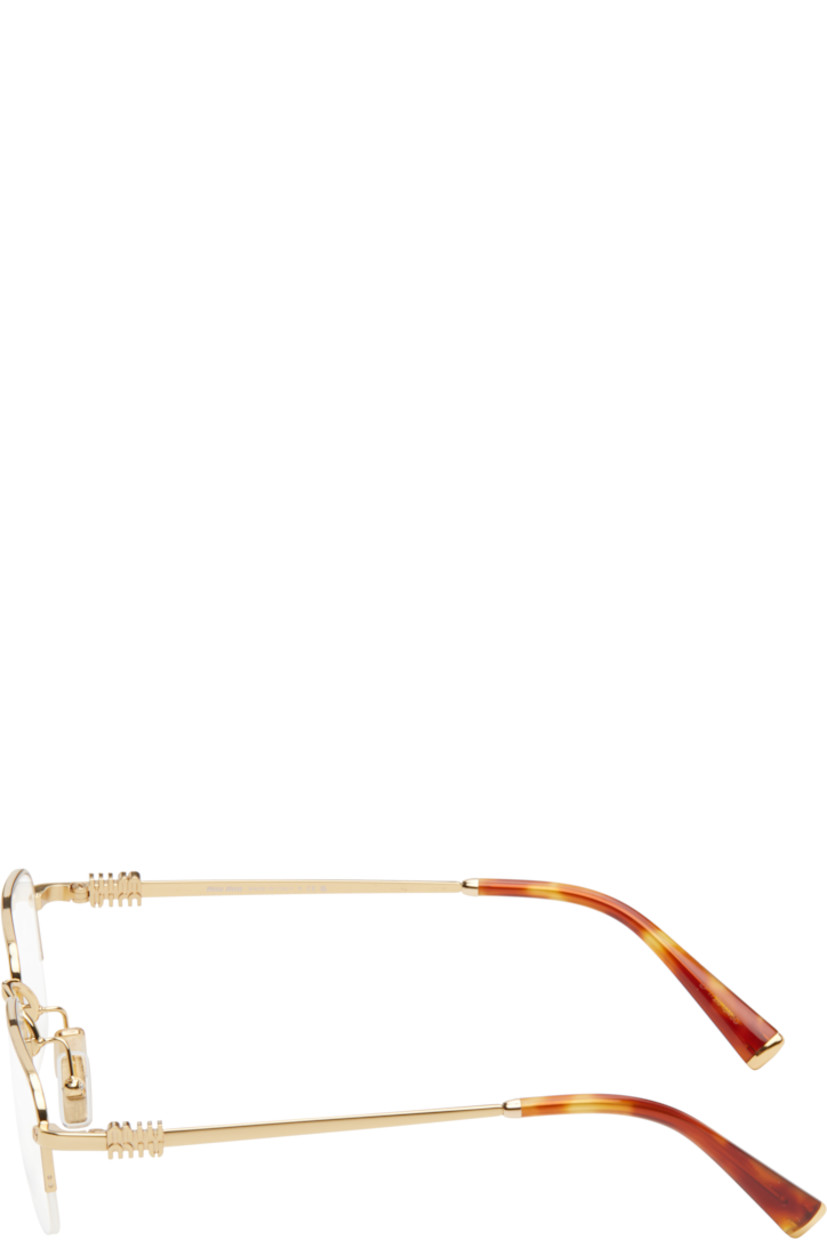 Rectangular semi-rimless metal-frame optical glasses in gold tone. 

· Adjustable rubber nose pads
· Logo hardware at temples
· Tortoiseshell acetate temple tips
· Includes case
· Size: 53.21 140 

Supplier color: Gold