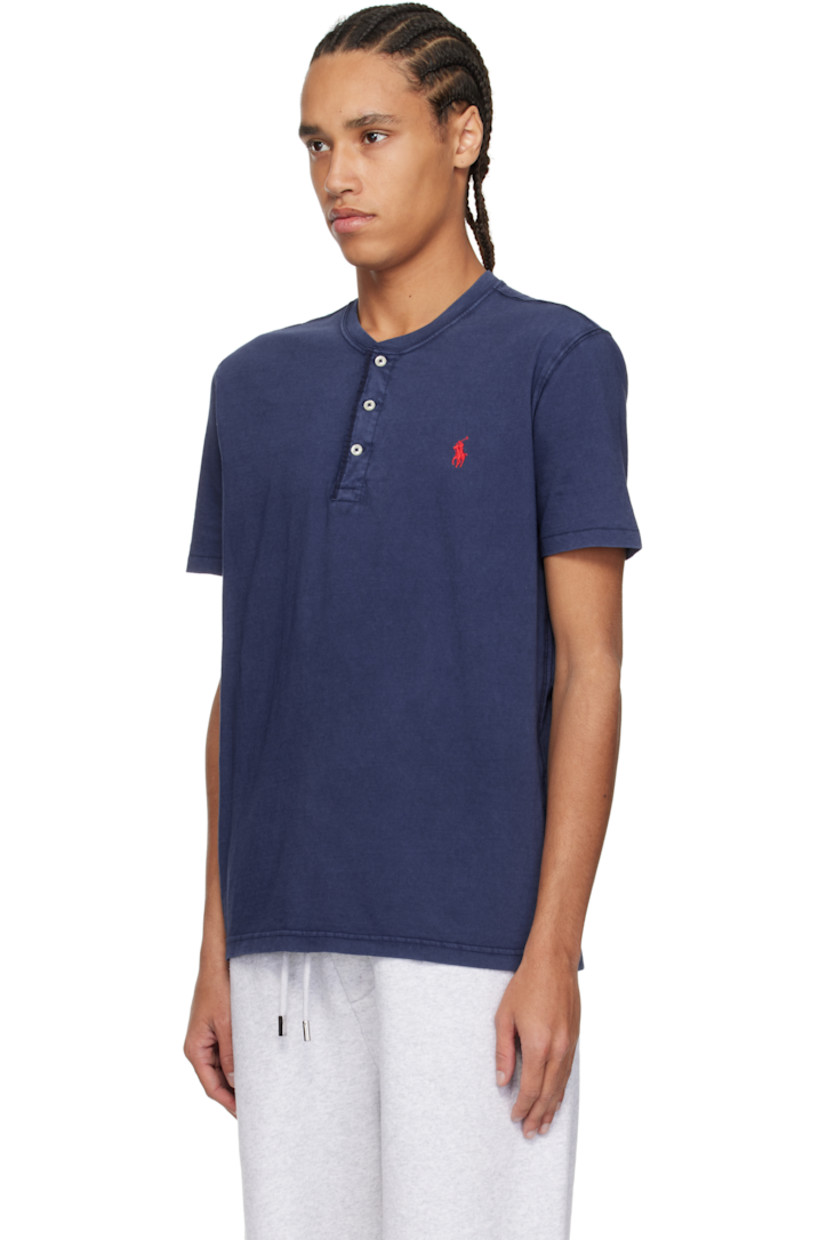 Washed slub cotton jersey henley. Fading throughout.

· Rib-knit crewneck
· Three-button placket
· Logo embroidered at chest

Supplier color: Cruise navy