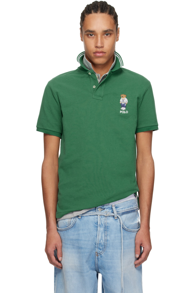 Cotton piqué polo.

· Jacquard stripes at rib-knit spread collar
· Two-button placket
· Logo graphic and text embroidered at chest
· Tennis-tail hem
· Rib-knit cuffs

Supplier color: Green heritage icons