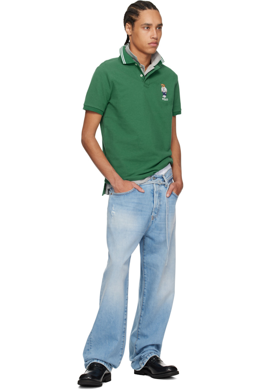 Cotton piqué polo.

· Jacquard stripes at rib-knit spread collar
· Two-button placket
· Logo graphic and text embroidered at chest
· Tennis-tail hem
· Rib-knit cuffs

Supplier color: Green heritage icons