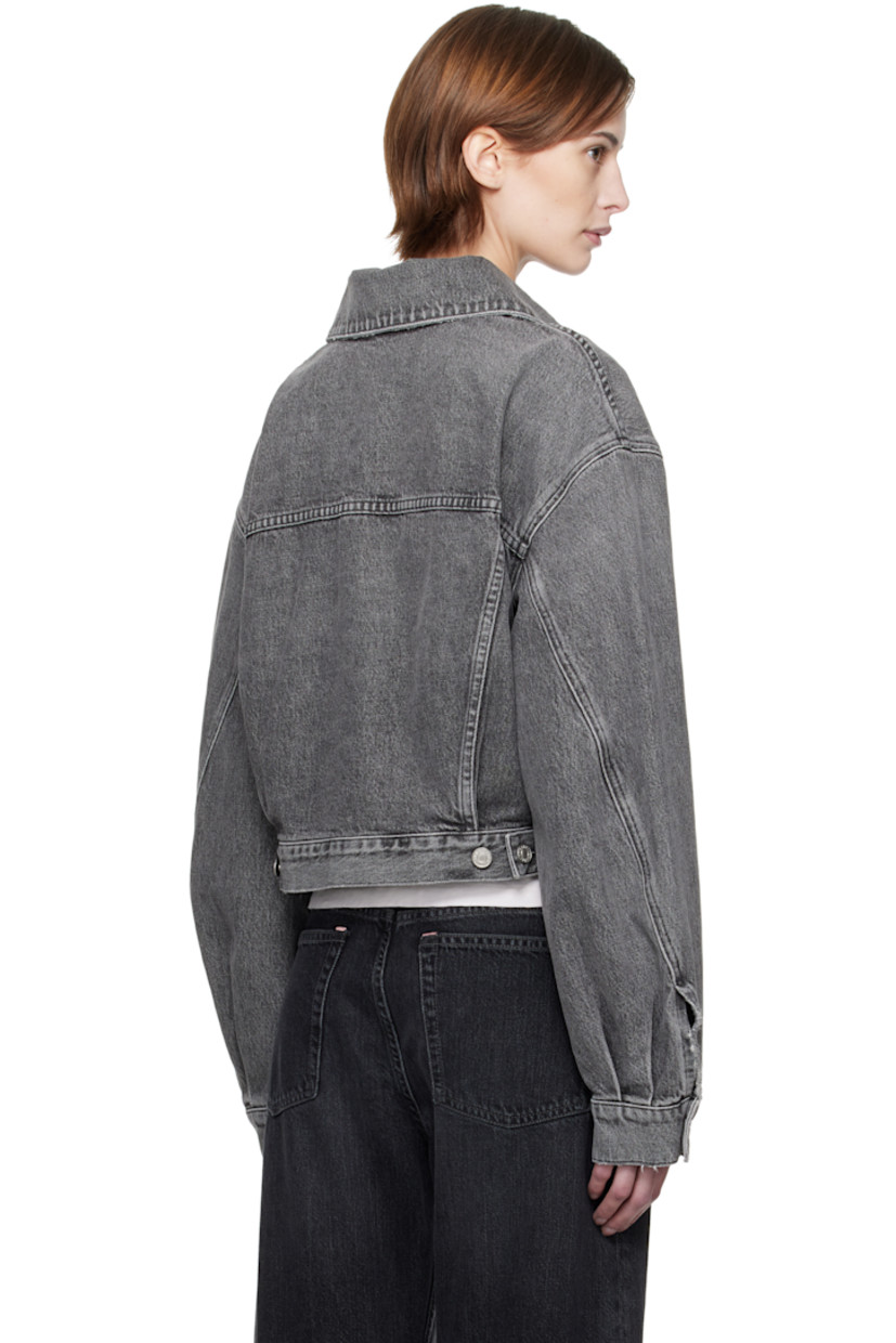 Non-stretch regenerative cotton denim jacket. Fading and subtle distressing throughout.

· Spread collar
· Button closure
· Flap pockets
· Cropped hem
· Dropped shoulders
· Single-button barrel cuffs
· Pleats and adjustable button tabs at back hem

Supplier color: Spirit