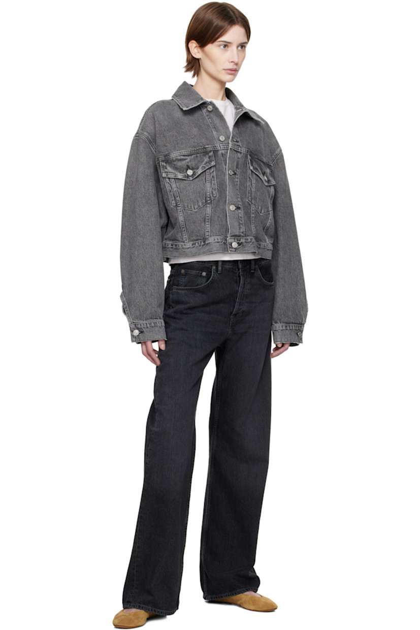 Non-stretch regenerative cotton denim jacket. Fading and subtle distressing throughout.

· Spread collar
· Button closure
· Flap pockets
· Cropped hem
· Dropped shoulders
· Single-button barrel cuffs
· Pleats and adjustable button tabs at back hem

Supplier color: Spirit