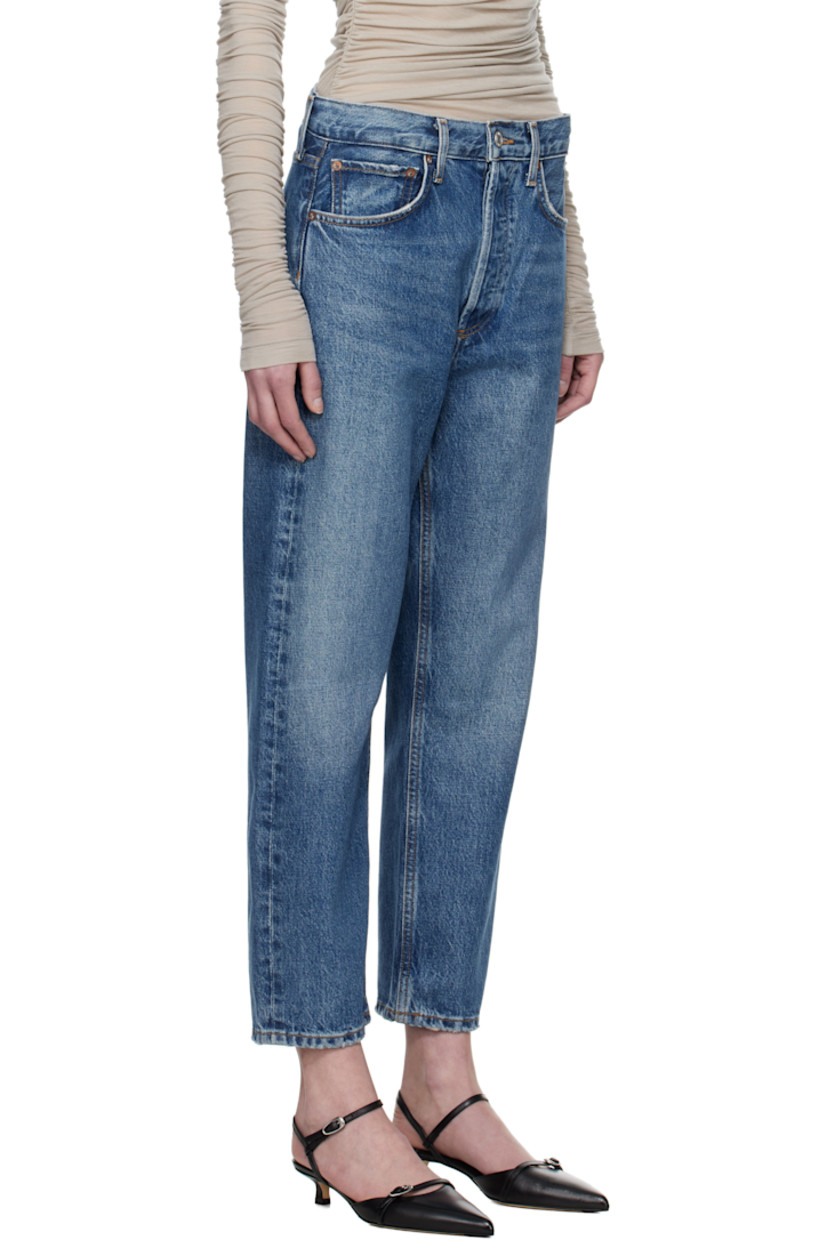 Non-stretch regenerative cotton-blend denim jeans. Fading, whiskering, and subtle distressing throughout.

· Loose-fit and straight-leg
· Mid-rise
· Belt loops
· Five-pocket styling
· Button-fly
· Cropped legs
· Contrasting stitching in tan

Supplier color: Essence