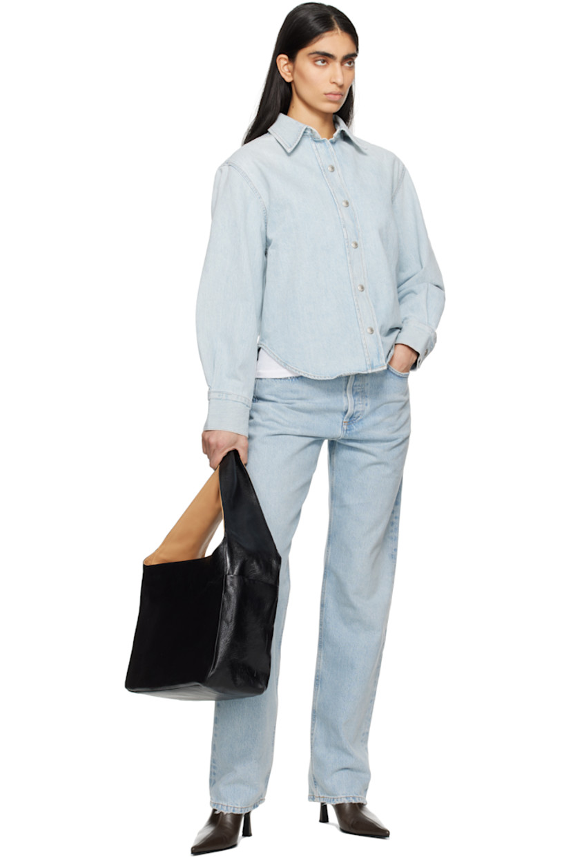 Straight-leg non-stretch regenerative cotton denim jeans. Fading, whiskering, and distressing throughout.

· High-rise
· Belt loops
· Five-pocket styling
· Button-fly
· Rip at knee
· Logo-engraved silver- and copper-tone hardware
· Contrast stitching in tan

Supplier color: Segment