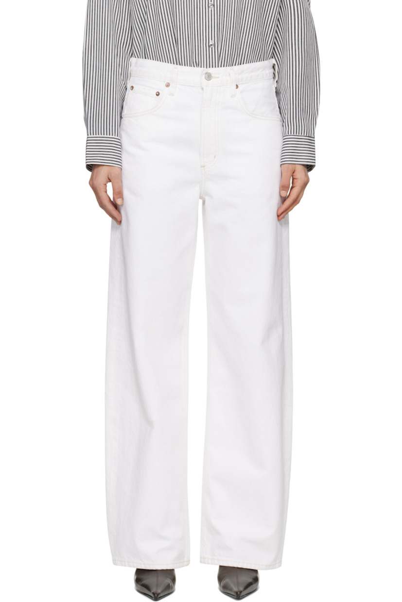 Tapered non-stretch regenerative cotton denim jeans. Subtle distressing throughout.

· Mid-rise
· Belt loops
· Five-pocket styling
· Zip-fly
· Curved outseams
· Logo-engraved silver- and copper-tone hardware
· Contrast stitching in tan

Supplier color: Milkshake