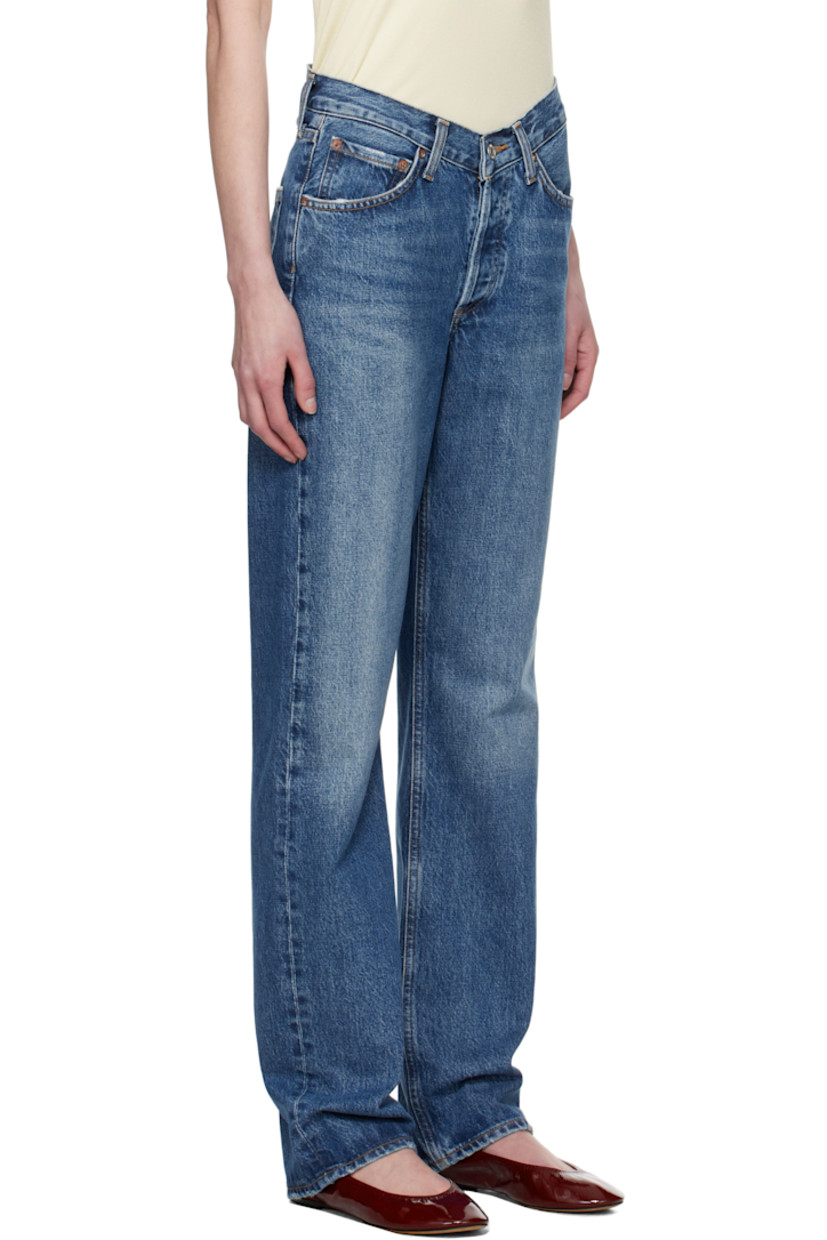 Non-stretch regenerative cotton-blend denim jeans. Fading, whiskering, and subtle distressing throughout.

· Loose-fit and straight-leg
· High-rise
· Belt loops
· Five-pocket styling
· Button-fly
· Contrasting stitching in tan

Supplier color: Essence