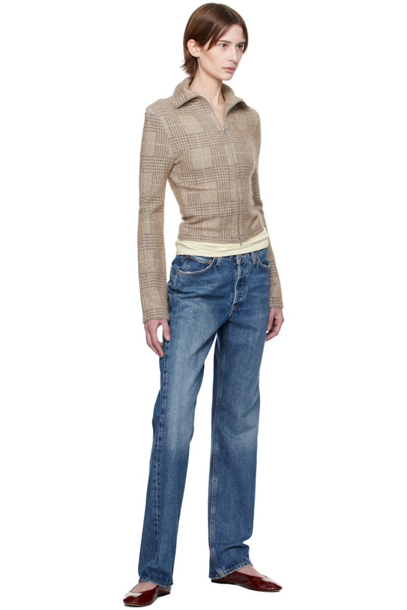 Non-stretch regenerative cotton-blend denim jeans. Fading, whiskering, and subtle distressing throughout.

· Loose-fit and straight-leg
· High-rise
· Belt loops
· Five-pocket styling
· Button-fly
· Contrasting stitching in tan

Supplier color: Essence