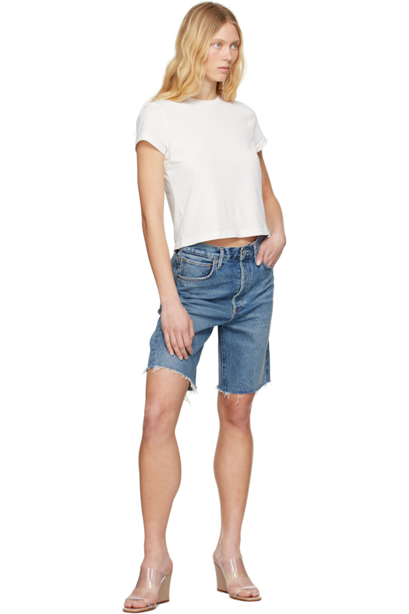 Non-stretch regenerative cotton denim shorts. Fading, whiskering, and subtle distressing throughout.

· Relaxed-fit
· Mid-rise
· Belt loops
· Five-pocket styling
· Button fly
· Frayed edge at cuffs
· Logo-engraved silver- and copper-tone hardware
· Contrast stitching in tan

Supplier color: Ruin
