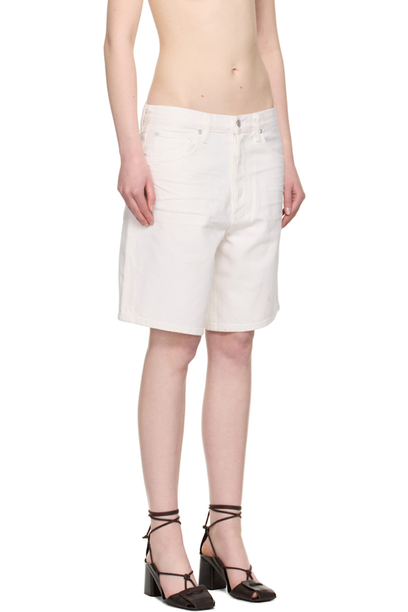 Non-stretch regenerative cotton denim shorts. 

· The Integrity Grown™-certified 
· Loose-fit
· Belt loops
· Five-pocket styling
· Button fly 
· Logo-engraved silver- and bronze-tone hardware

Supplier color: Fortune cookie