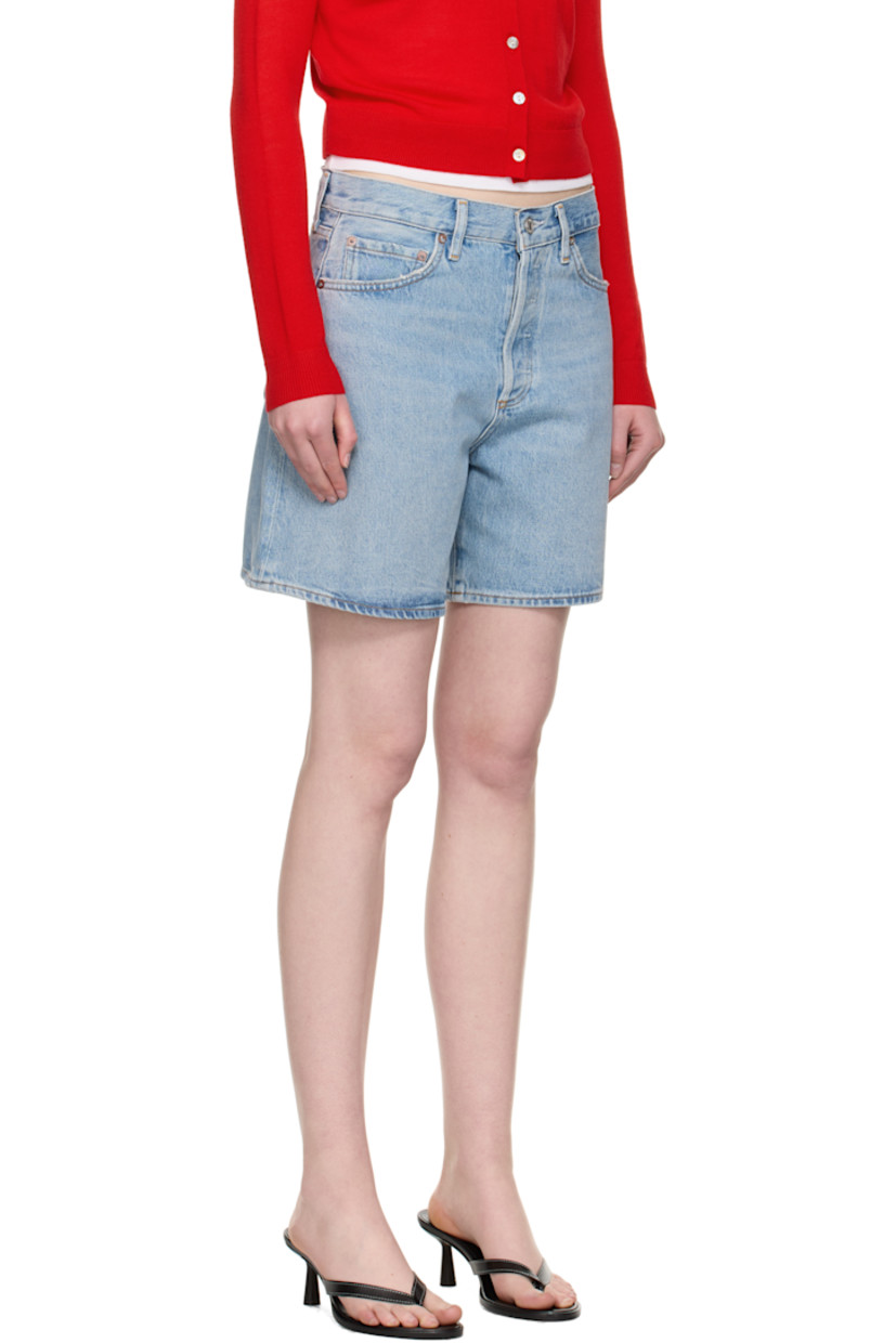 Non-stretch regenerative cotton denim shorts. Fading, whiskering, and subtle distressing throughout. 

· The Integrity Grown™-certified 
· Wide-leg 
· High-rise 
· Belt loops
· Five-pocket styling
· Button fly 
· Logo-engraved silver- and bronze-tone hardware
· Contrast stitching in tan 

Supplier color: Coax
