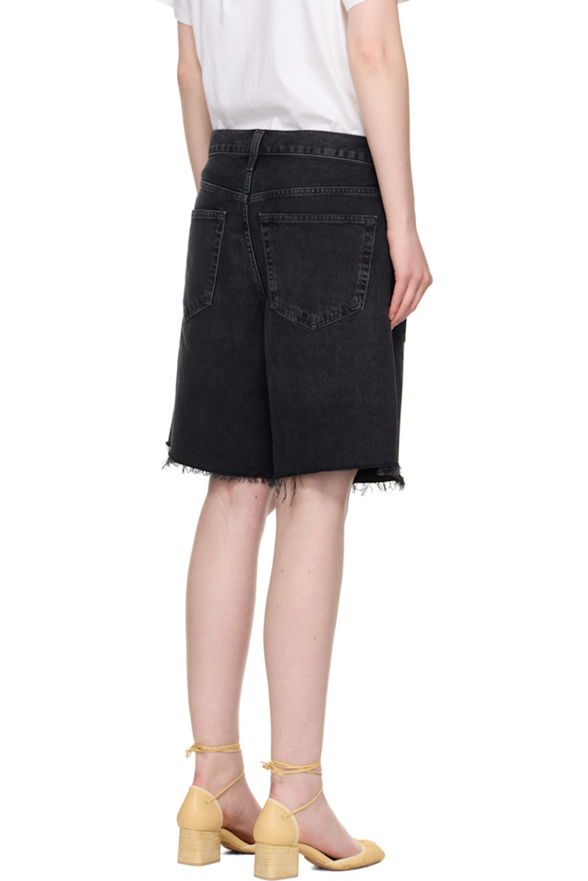 Non-stretch regenerative cotton denim shorts. Fading, whiskering, and subtle distressing throughout. 

· Loose-fit
· Belt loops
· Five-pocket styling
· Button fly 
· Raw edge at hem
· Logo-engraved silver- and bronze-tone hardware

Supplier color: Bounce