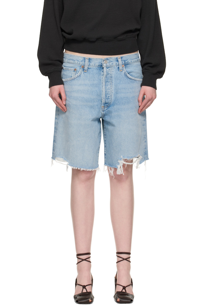 Non-stretch regenerative cotton denim shorts. Fading, whiskering, and subtle distressing throughout. 

· The Integrity Grown™-certified 
· Loose-fit
· Belt loops
· Five-pocket styling
· Button fly 
· Raw edge at hem
· Logo-engraved silver- and bronze-tone hardware
· Contrast stitching in tan 

Supplier color: Force