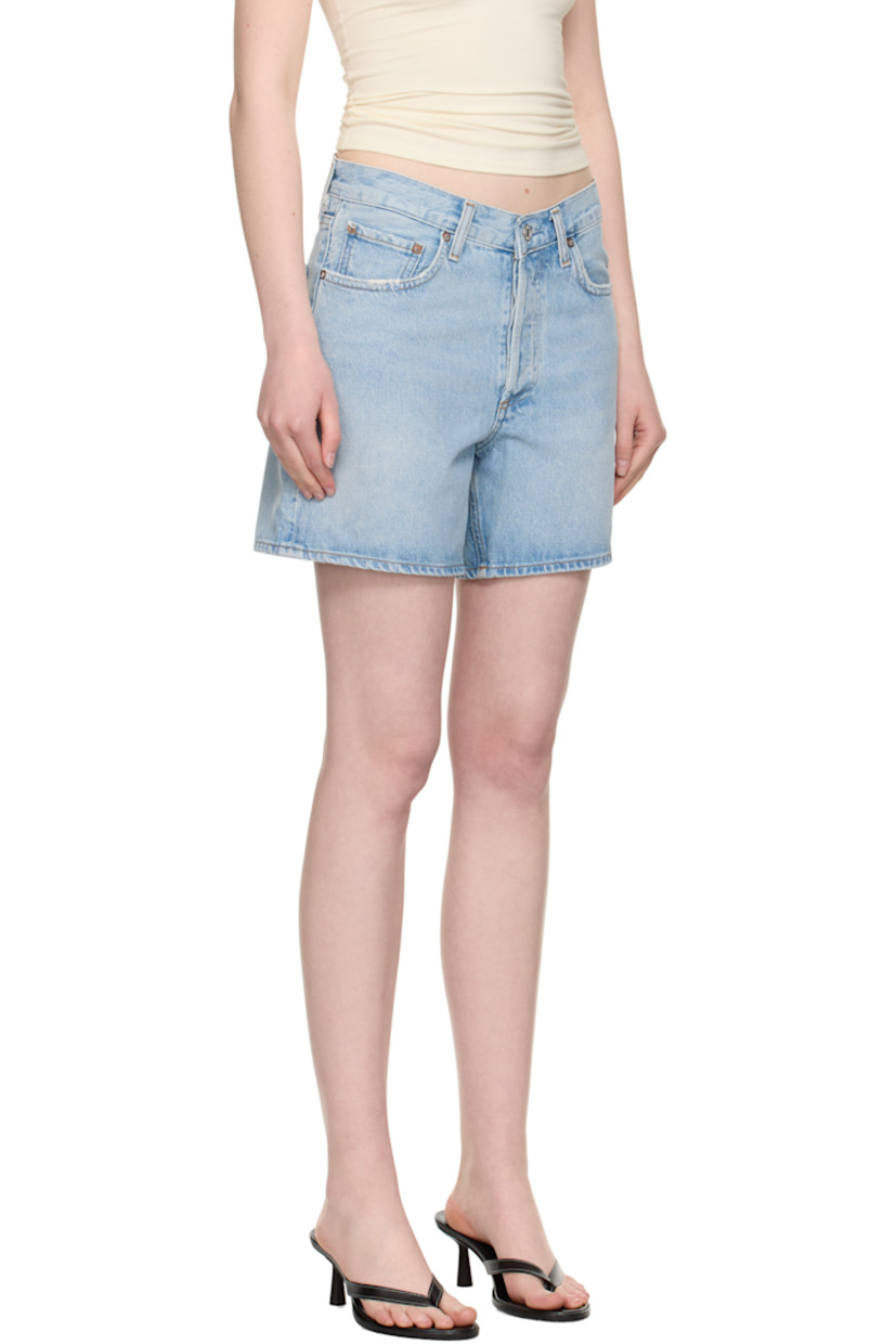 Non-stretch regenerative cotton denim shorts. Fading, whiskering, and subtle distressing throughout. 

· The Integrity Grown™-certified 
· Loose-fit
· Belt loops
· Five-pocket styling
· Button fly 
· Logo-engraved silver- and bronze-tone hardware
· Contrast stitching in tan 

Supplier color: Backbeat