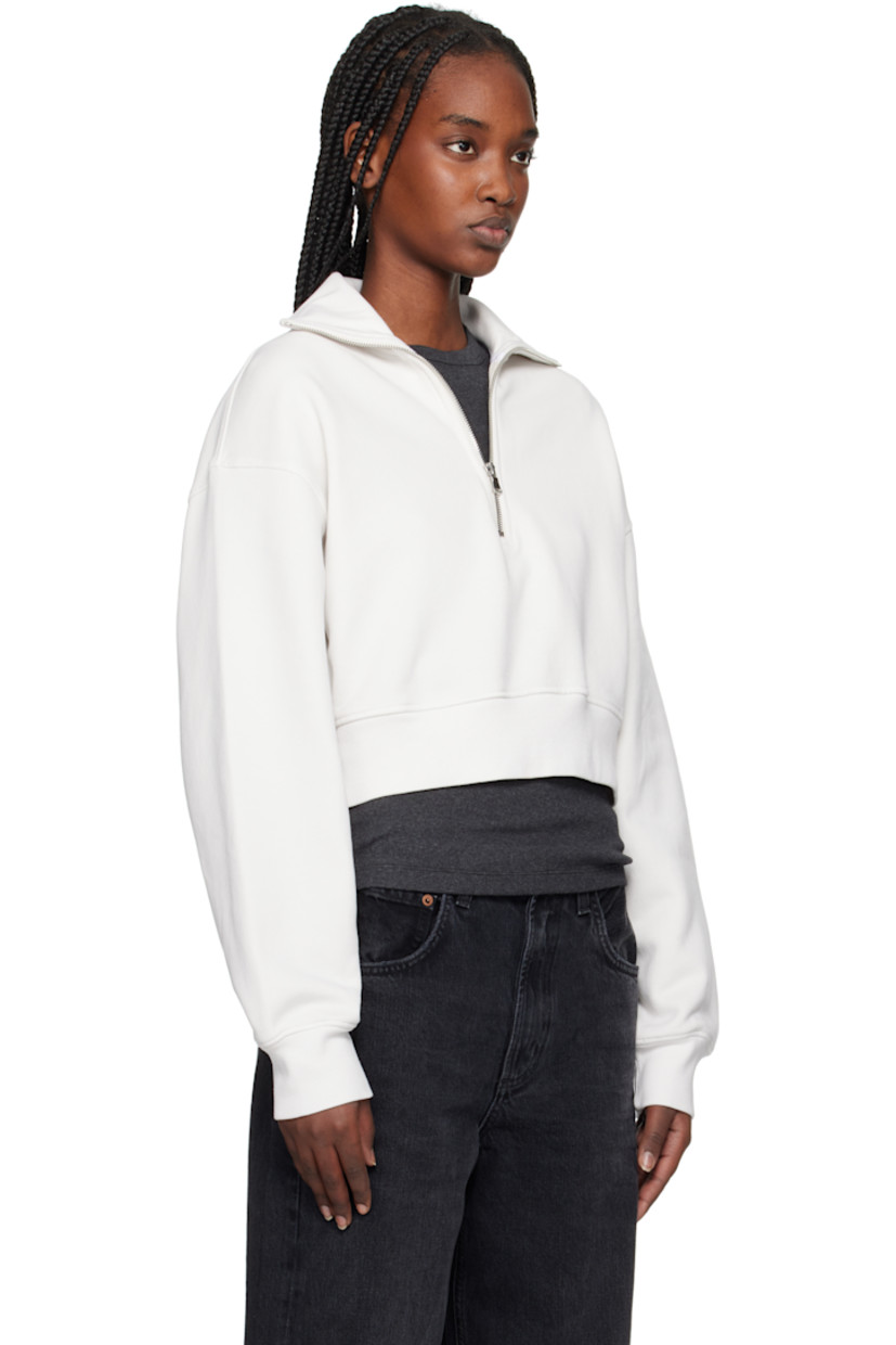 Heavyweight Supima cotton fleece sweatshirt.

· Relaxed-fit 
· Rib-knit spread collar, cropped hem, and cuffs
· Half-zip closure
· Dropped shoulders

Supplier color: Wired