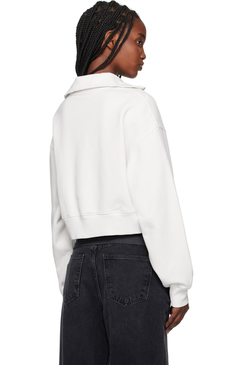 Heavyweight Supima cotton fleece sweatshirt.

· Relaxed-fit 
· Rib-knit spread collar, cropped hem, and cuffs
· Half-zip closure
· Dropped shoulders

Supplier color: Wired