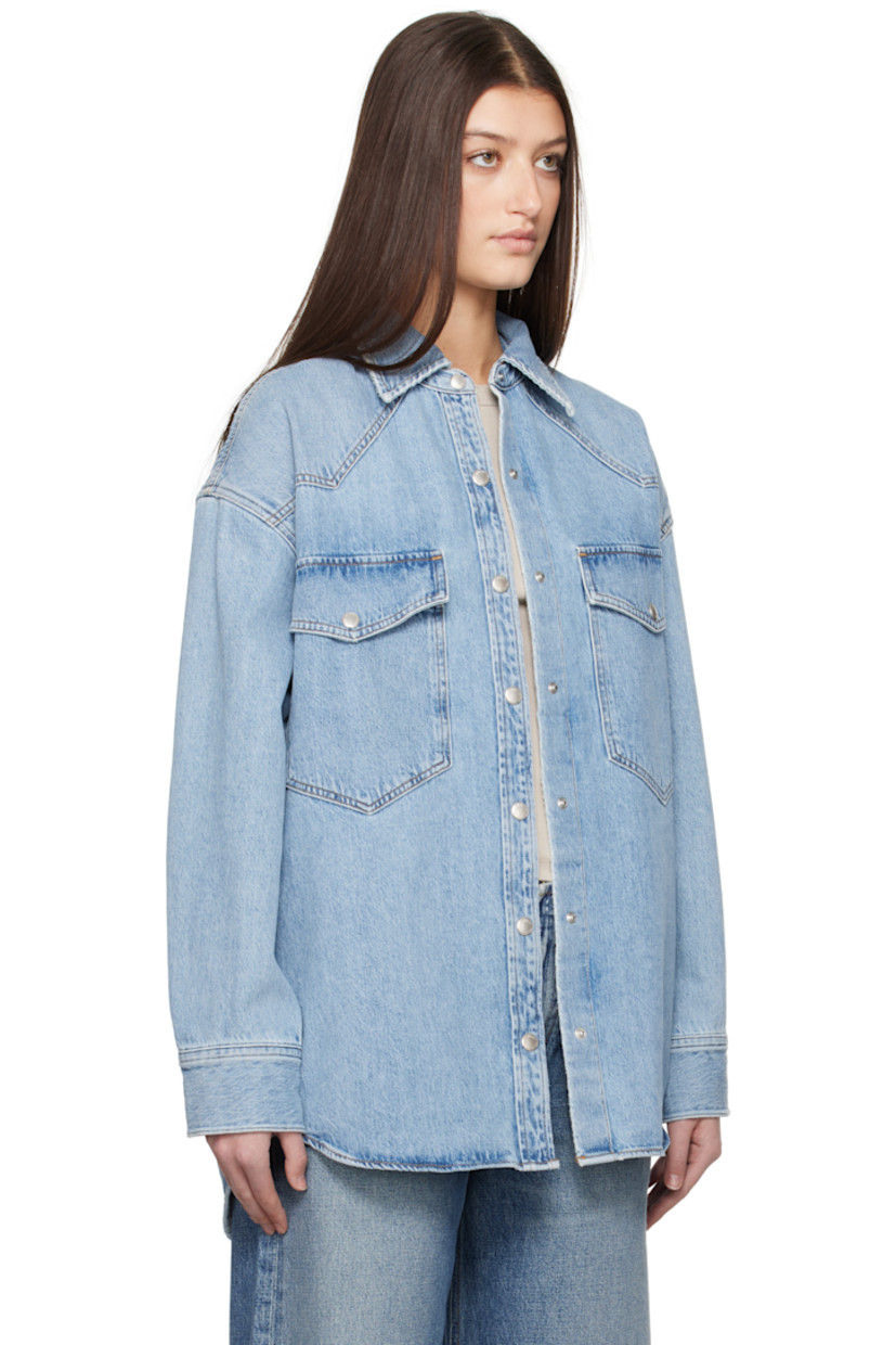 Loose-fit non-stretch regenerative cotton denim shirt. Fading throughout.

· Spread collar
· Press-stud closure
· Flap pockets
· Shirttail hem
· Pleat at press-stud barrel cuffs
· Logo-engraved silver-tone hardware
· Contrast stitching in tan

Supplier color: Drift